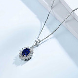 1 2/5 CTW Oval Blue Nano Sapphire Oval Halo Pendant Necklace in 0.925 White Sterling Silver With Chain (MDS230065)
