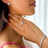 1 1/2 CTW Round Diamond 6-Prong Solitaire with Accents Engagement Ring in 14K White Gold with Baguette Accents (MD220145)
