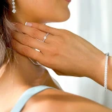 1/2 CTW Round Diamond Shared-prong Trellis Solitaire with Accents Engagement Ring in 10K White Gold (MD240084)