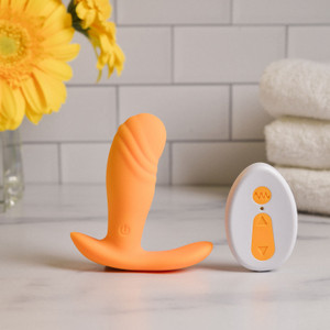 Evolved Novelties Creamsicle - Creamsicle-colored wearable remote vibe Evolved Novelties Creamsicle - Creamsicle-colored wearable remote vibe