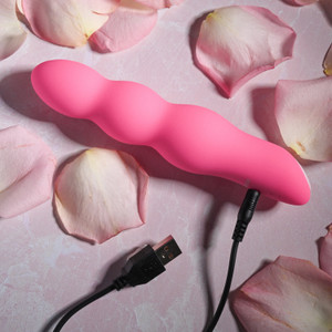 Evolved Novelties - Afterglow - Light-up bulby vibrator lifestyle product photo Evolved Novelties - Afterglow - Light-up bulby vibrator lifestyle product photo