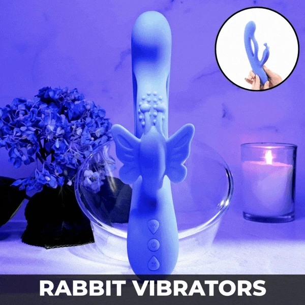 Rabbit Vibrators — blue rabbit vibrator with two arms, held in a hand