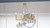 Quoizel Kelleher Five Light Chandelier in Nouveau Painted Weathered Brass - KEL5025NWS
