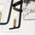 Quorum Tioga Five Light Chandelier in Textured Black w/ Aged Brass - 637-5-69