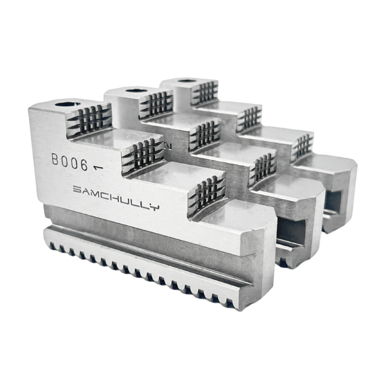 Monoblock stepped hard jaws for quick jaw change chucks