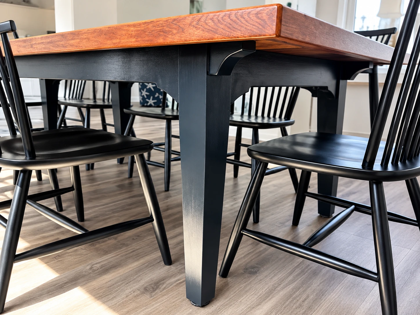 Modern tapered square furniture leg on a finished dining table