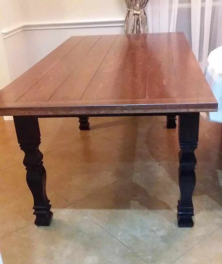 Dining table built with square wood legs