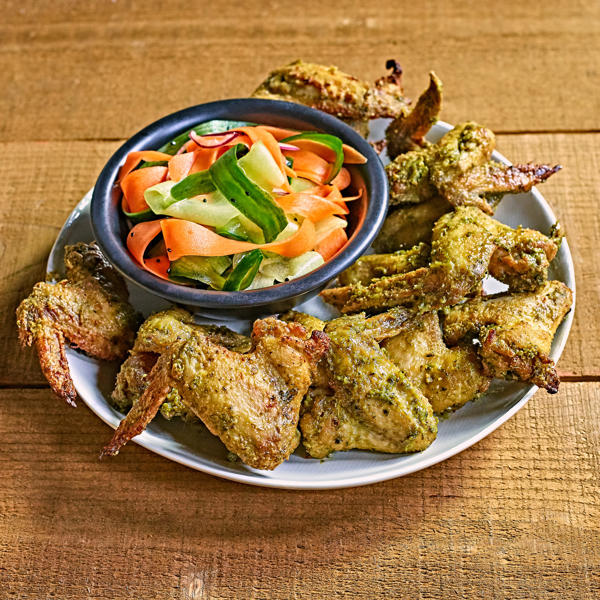 Chicken wings in Tahini, Zhoug and honey with a Moscatel vinegar salad