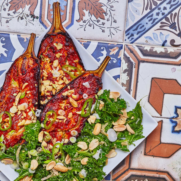 Roast aubergines with Rose Harissa and miso and a kale, peanut and preserved lemon salad