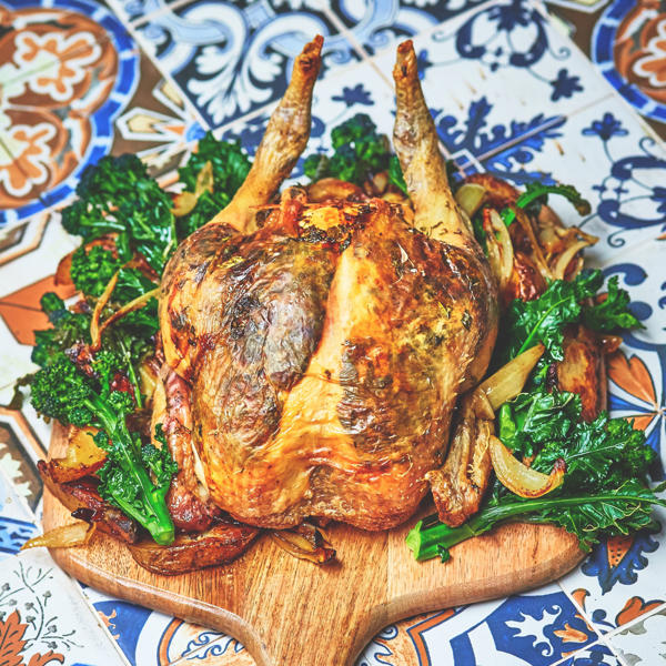 Roast Chicken stuffed with Beldi Preserved Lemons, garlic and parsley