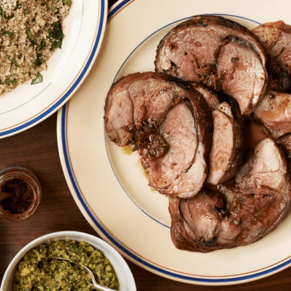 Roast lamb stuffed with Rose Harissa, Dates and Pistachio Sauce