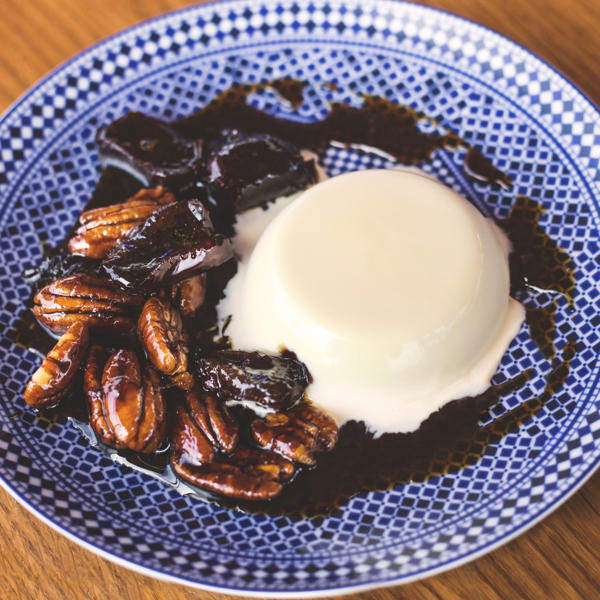 Rose Buttermilk Panna Cotta with Date, Pecan, Rum and Pomegranate Molasses Syrup