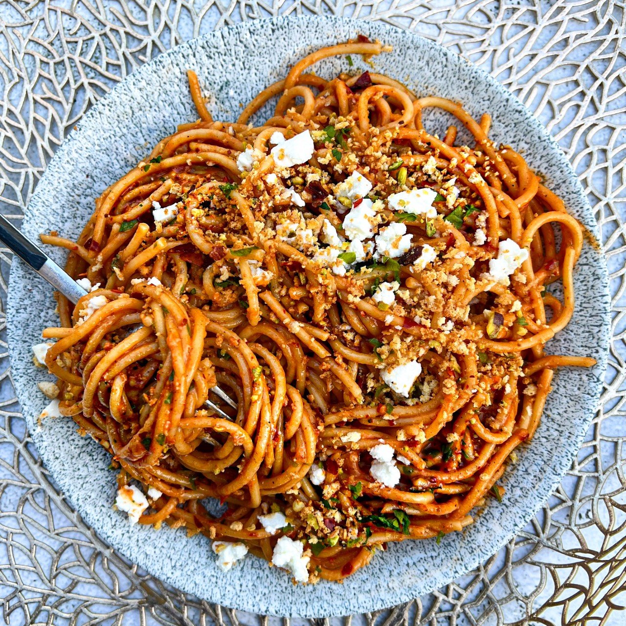 ROASTED RED PEPPER AND HARISSA SPAGHETTI, WITH FETA AND PISTACHIO CRUMB