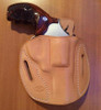 Revolver Pancake holster in un-dyed natural leather.
