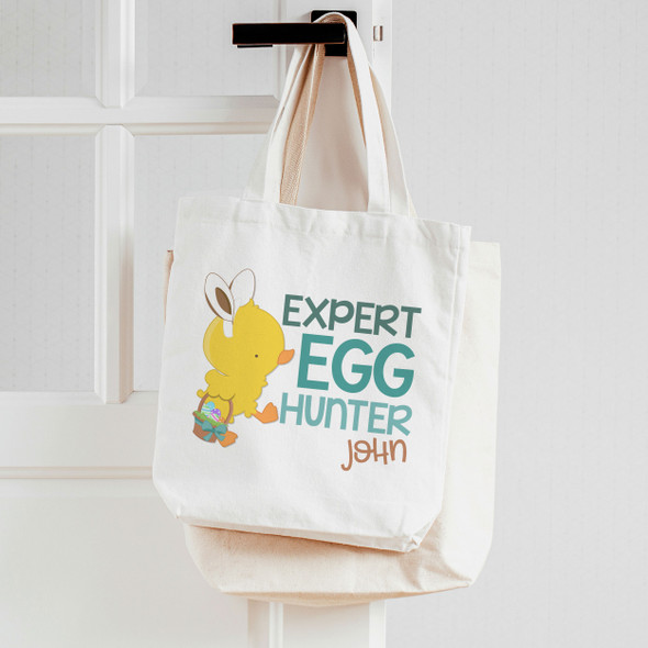 Easter boy expert egg hunter tote bag