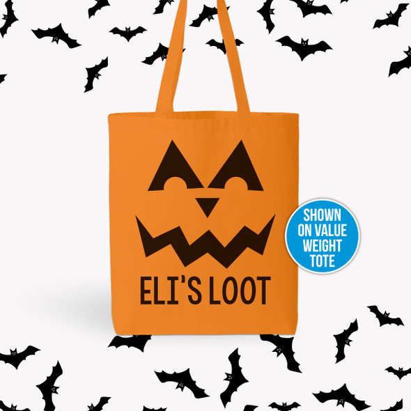 Pumpkin face personalized orange trick or treat tote bag