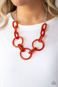 Suspended from a shimmery silver chain, a collision of acrylic orange, pink, red or blue links connect below the collar in a statement-making fashion. Features an adjustable clasp closure.
Sold as one individual necklace. Includes one pair of matching earrings. Suspended from a shimmery silver chain, a collision of acrylic orange, pink, red or blue links connect below the collar in a statement-making fashion. Features an adjustable clasp closure.
Sold as one individual necklace. Includes one pair of matching earrings.