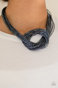 Countless strands of metallic blue seed beads delicately knot together below the collar to create an unforgettable statement piece. Features an adjustable clasp closure. Countless strands of metallic blue seed beads delicately knot together below the collar to create an unforgettable statement piece. Features an adjustable clasp closure.