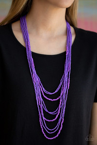 Varying in size, row after row of vivacious purple seed beads cascade down the chest, creating summery layers. Features an adjustable clasp closure.

Sold as one individual necklace. Includes one pair of matching earrings