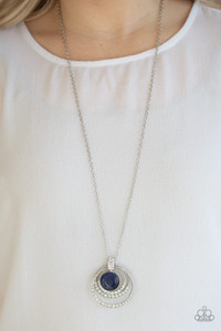 As if dipped in rhinestones, the bottoms of textured silver hoops are encrusted in glassy white rhinestones as they swing from the bottom of a white rhinestone encrusted fitting. A glowing blue cat's eye stone adorns the center, adding a tranquil splash of color to the hypnotizing pendant. Features an adjustable clasp closure.
Sold as one individual necklace. Includes one pair of matching earrings. As if dipped in rhinestones, the bottoms of textured silver hoops are encrusted in glassy white rhinestones as they swing from the bottom of a white rhinestone encrusted fitting. A glowing blue cat's eye stone adorns the center, adding a tranquil splash of color to the hypnotizing pendant. Features an adjustable clasp closure.
Sold as one individual necklace. Includes one pair of matching earrings.