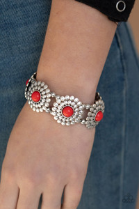 Dotted with red beaded centers, silver petaled blossoms are threaded along a stretchy band around the wrist for a colorful look.
Sold as one individual bracelet. Dotted with red beaded centers, silver petaled blossoms are threaded along a stretchy band around the wrist for a colorful look.
Sold as one individual bracelet.
