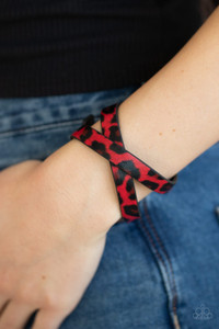 Featuring a red and black cheetah pattern, a strip of black leather double wraps around the wrist for a wild look. Features an adjustable snap closure.
Sold as one individual bracelet. Featuring a red and black cheetah pattern, a strip of black leather double wraps around the wrist for a wild look. Features an adjustable snap closure.
Sold as one individual bracelet.