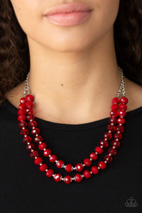 Infused with dainty silver beads, a collection of glassy and polished red crystal-like beads are threaded along two invisible wires, creating glamorous layers below the collar. Features an adjustable clasp closure.
Sold as one individual necklace. Includes one pair of matching earrings. Infused with dainty silver beads, a collection of glassy and polished red crystal-like beads are threaded along two invisible wires, creating glamorous layers below the collar. Features an adjustable clasp closure.
Sold as one individual necklace. Includes one pair of matching earrings.