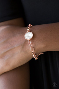 A dramatic white gem attaches to a shiny copper chain, creating a blinding centerpiece atop the wrist. Features a toggle closure.
Sold as one individual bracelet. A dramatic white gem attaches to a shiny copper chain, creating a blinding centerpiece atop the wrist. Features a toggle closure.
Sold as one individual bracelet.