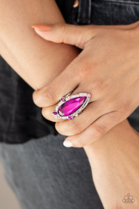 Varying in color and shape, mismatched pink and iridescent rhinestones sporadically dot the front of a shiny silver teardrop frame. Featuring a flashy faceted surface, an oversized pink teardrop gem adorns the center for a dazzling finish. Features a stretchy band for a flexible fit.
Sold as one individual ring. Varying in color and shape, mismatched pink and iridescent rhinestones sporadically dot the front of a shiny silver teardrop frame. Featuring a flashy faceted surface, an oversized pink teardrop gem adorns the center for a dazzling finish. Features a stretchy band for a flexible fit.
Sold as one individual ring.