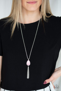 A pink teardrop gem swings from the bottom of a lengthened silver chain for a dramatic look. A shimmery silver chain tassel swings from the bottom of the pendant for a glamorous finish. Features an adjustable clasp closure.
Sold as one individual necklace. Includes one pair of matching earrings. A pink teardrop gem swings from the bottom of a lengthened silver chain for a dramatic look. A shimmery silver chain tassel swings from the bottom of the pendant for a glamorous finish. Features an adjustable clasp closure.
Sold as one individual necklace. Includes one pair of matching earrings.