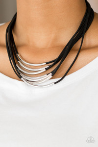 Glistening silver rods slide along strips of black suede, creating earthy layers below the collar. Features an adjustable clasp closure.
Sold as one individual necklace. Includes one pair of matching earrings. Glistening silver rods slide along strips of black suede, creating earthy layers below the collar. Features an adjustable clasp closure.
Sold as one individual necklace. Includes one pair of matching earrings.