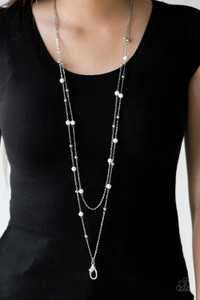 Neutral white and dainty silver beads trickle along two shimmery silver chains, creating colorful layers down the chest. A lobster clasp hangs from the bottom of the design to allow a name badge or other item to be attached. Features an adjustable clasp closure.
Sold as one individual lanyard. Includes one pair of matching earrings. Neutral white and dainty silver beads trickle along two shimmery silver chains, creating colorful layers down the chest. A lobster clasp hangs from the bottom of the design to allow a name badge or other item to be attached. Features an adjustable clasp closure.
Sold as one individual lanyard. Includes one pair of matching earrings.