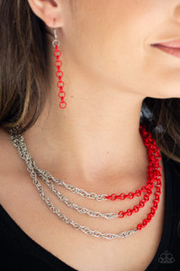 Rows of shimmery silver chain merge with shiny red chains, creating colorful layers below the collar. Features an adjustable clasp closure.
Sold as one individual necklace. Includes one pair of matching earrings. Rows of shimmery silver chain merge with shiny red chains, creating colorful layers below the collar. Features an adjustable clasp closure.
Sold as one individual necklace. Includes one pair of matching earrings.