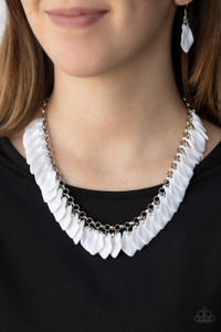 Painted in a refreshing white finish, curved acrylic petals cascade from the bottom of a shimmery silver chain, creating a flirtatious fringe below the collar. Features an adjustable clasp closure.
Sold as one individual necklace. Includes one pair of matching earrings Painted in a refreshing white finish, curved acrylic petals cascade from the bottom of a shimmery silver chain, creating a flirtatious fringe below the collar. Features an adjustable clasp closure.
Sold as one individual necklace. Includes one pair of matching earrings