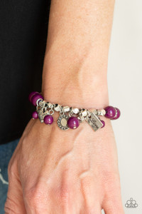 Stamped in floral details and the word, "Love," a romantic assortment of silver charms and a dainty white rhinestone swings from a plum beaded bracelet around the wrist for a charmingly colorful look.
Sold as one individual bracelet. Stamped in floral details and the word, "Love," a romantic assortment of silver charms and a dainty white rhinestone swings from a plum beaded bracelet around the wrist for a charmingly colorful look.
Sold as one individual bracelet.