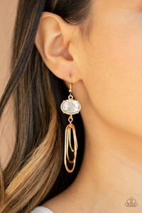 Oval shaped gold frames drip from the bottom of an oversized white rhinestone gem, creating a rippling fringe. Earring attaches to a standard fishhook fitting.
Sold as one pair of earrings. Oval shaped gold frames drip from the bottom of an oversized white rhinestone gem, creating a rippling fringe. Earring attaches to a standard fishhook fitting.
Sold as one pair of earrings.