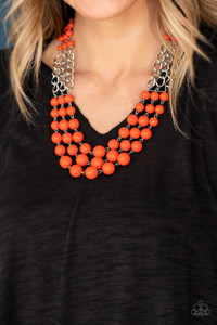 Sections of thick silver chains and bubbly orange beaded rows layer below the collar, creating statement-making layers. Features an adjustable clasp closure.
Sold as one individual necklace. Includes one pair of matching earrings. Sections of thick silver chains and bubbly orange beaded rows layer below the collar, creating statement-making layers. Features an adjustable clasp closure.
Sold as one individual necklace. Includes one pair of matching earrings.