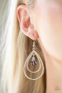 A purple crystal-like bead swings from the top of a double teardrop frame radiating with smooth and rope-like textures for a refined look. Earring attaches to a standard fishhook fitting.
Sold as one pair of earrings. A purple crystal-like bead swings from the top of a double teardrop frame radiating with smooth and rope-like textures for a refined look. Earring attaches to a standard fishhook fitting.
Sold as one pair of earrings.