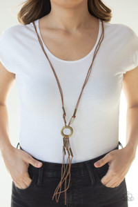 Rectangular brass beads are knotted in place along strands of shiny brown cording, creating a rustic tassel at the bottom of an antiqued brass ring. Features an adjustable clasp closure.
Sold as one individual necklace. Includes one pair of matching earrings. Rectangular brass beads are knotted in place along strands of shiny brown cording, creating a rustic tassel at the bottom of an antiqued brass ring. Features an adjustable clasp closure.
Sold as one individual necklace. Includes one pair of matching earrings.