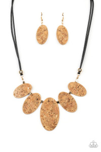 Featuring natural cork-like finishes, oval frames and shimmery gold cube beads flare out into an earthy fringe below the collar. Features an adjustable clasp closure.
Sold as one individual necklace. Includes one pair of matching earrings. Featuring natural cork-like finishes, oval frames and shimmery gold cube beads flare out into an earthy fringe below the collar. Features an adjustable clasp closure.
Sold as one individual necklace. Includes one pair of matching earrings.