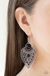 Black, Cinnamon Stick, and Ash beads decorate the front of a spade shaped silver frame radiating with linear and zigzagging details for a tribal inspired look. Earring attaches to a standard fishhook fitting.
Sold as one pair of earrings. Black, Cinnamon Stick, and Ash beads decorate the front of a spade shaped silver frame radiating with linear and zigzagging details for a tribal inspired look. Earring attaches to a standard fishhook fitting.
Sold as one pair of earrings.