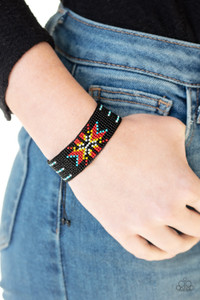 Threaded along invisible threads, a dainty collection of black, white, blue, yellow, and red seed beads weave into a colorful textile pattern across the wrist for a tribal inspired look. Features an adjustable sliding knot closure.
Sold as one individual bracelet. Threaded along invisible threads, a dainty collection of black, white, blue, yellow, and red seed beads weave into a colorful textile pattern across the wrist for a tribal inspired look. Features an adjustable sliding knot closure.
Sold as one individual bracelet.