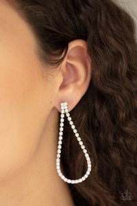Infused with sleek silver fittings, a strand of glittery white rhinestones loops in a teardrop frame for a glamorous look. Earring attaches to a standard post fitting.
Sold as one pair of post earrings. Infused with sleek silver fittings, a strand of glittery white rhinestones loops in a teardrop frame for a glamorous look. Earring attaches to a standard post fitting.
Sold as one pair of post earrings.