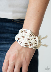 Soft twine is decoratively knotted around a silver cuff creating a trendy design atop the wrist.
Sold as one individual bracelet. Soft twine is decoratively knotted around a silver cuff creating a trendy design atop the wrist.
Sold as one individual bracelet.