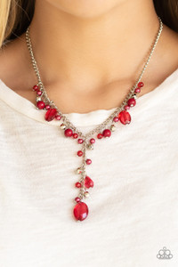 Mismatched polished red beads, crystal-like beads, and faceted silver beads dance along a shimmery silver chain. Matching beading trickles along a single silver chain, creating a romantic extended pendant below the collar. Features an adjustable clasp closure.
Sold as one individual necklace. Includes one pair of matching earrings. Mismatched polished red beads, crystal-like beads, and faceted silver beads dance along a shimmery silver chain. Matching beading trickles along a single silver chain, creating a romantic extended pendant below the collar. Features an adjustable clasp closure.
Sold as one individual necklace. Includes one pair of matching earrings.