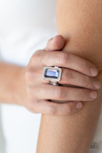 Featuring a regal emerald style cut, an oversized purple gem is bordered by a silver frame encrusted in glassy white rhinestones for a glamorous look. Features a stretchy a band for a flexible fit.
Sold as one individual ring. Featuring a regal emerald style cut, an oversized purple gem is bordered by a silver frame encrusted in glassy white rhinestones for a glamorous look. Features a stretchy a band for a flexible fit.
Sold as one individual ring.