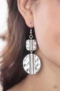 Brushed in an antiqued shimmer, a hammered square and oval silver frame have been threaded along a dainty rod, creating a handcrafted lure. Earring attaches to a standard fishhook fitting.
Sold as one pair of earrings. Brushed in an antiqued shimmer, a hammered square and oval silver frame have been threaded along a dainty rod, creating a handcrafted lure. Earring attaches to a standard fishhook fitting.
Sold as one pair of earrings.
