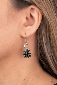 Dainty black beads are threaded along invisible wires, creating refined clusters of beaded teardrops at the bottom of a dainty silver hoop. Earring attaches to a standard fishhook fitting.
Sold as one pair of earrings. Dainty black beads are threaded along invisible wires, creating refined clusters of beaded teardrops at the bottom of a dainty silver hoop. Earring attaches to a standard fishhook fitting.
Sold as one pair of earrings.
