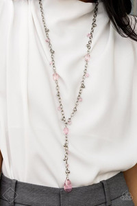 An array of translucent pink crystal-like beads and shiny silver accents trickles along a lengthened silver chain. A matching pink crystal teardrop swings from the bottom of a matching silver chain that has been attached to the refined design, creating a timeless extended pendant. Features an adjustable clasp closure.
Sold as one individual necklace. Includes one pair of matching earrings. An array of translucent pink crystal-like beads and shiny silver accents trickles along a lengthened silver chain. A matching pink crystal teardrop swings from the bottom of a matching silver chain that has been attached to the refined design, creating a timeless extended pendant. Features an adjustable clasp closure.
Sold as one individual necklace. Includes one pair of matching earrings.