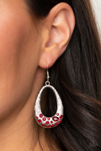 A glittery collection of oval and round red rhinestones is encrusted along the bottom of a shimmery silver teardrop featuring a shiny scratched surface for a refined finish. Earring attaches to a standard fishhook fitting.

Sold as one pair of earrings.